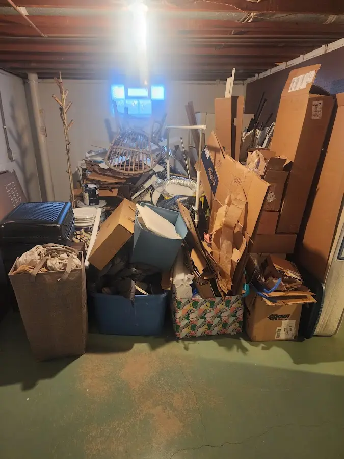 Roll-off dumpster container at job site for 2 Yard Dumpster Rental in Aston